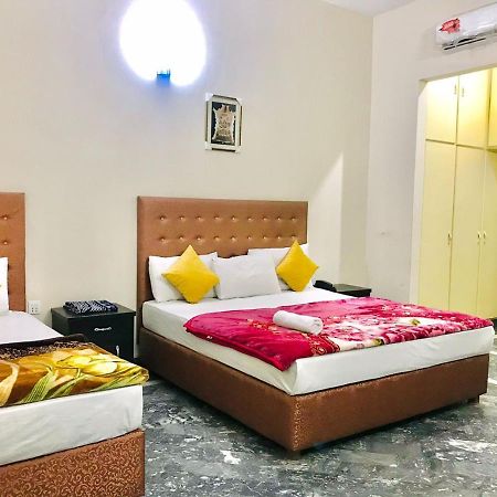 Hotel Rose Inn ลาฮอร์ ภายนอก รูปภาพ