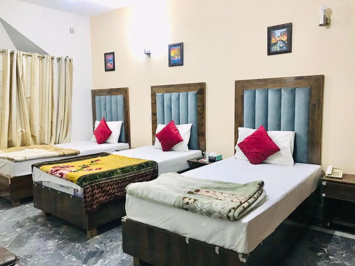 Hotel Rose Inn ลาฮอร์ ภายนอก รูปภาพ