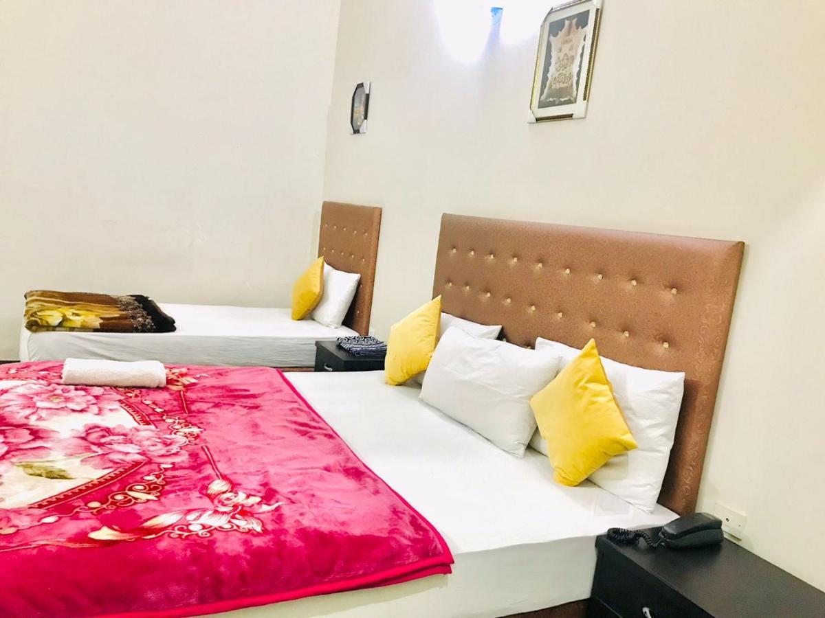 Hotel Rose Inn ลาฮอร์ ภายนอก รูปภาพ