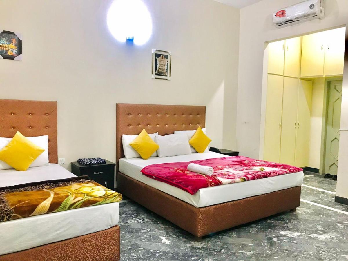 Hotel Rose Inn ลาฮอร์ ภายนอก รูปภาพ